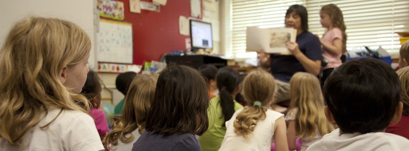 teacher reading to students